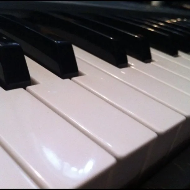 Close-up of a piano’s black and white keys.